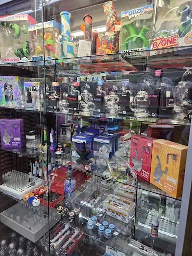 LiberT Souvenirs storefront at 213 Alamo Plaza in downtown San Antonio, entrance to the Smoke To Live vape counter